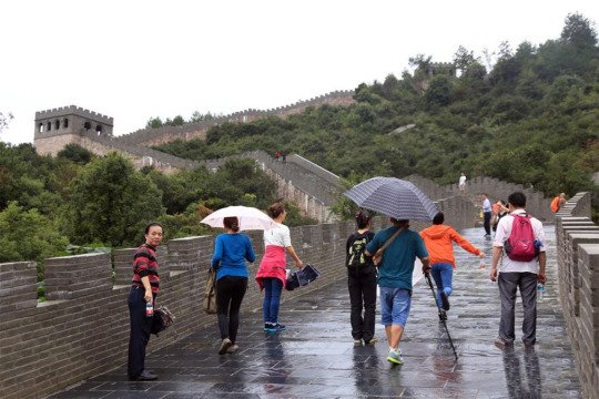 Pic shows: Visitors in the copycat version of the great Wall of China. With tourists now so crowded on the great Wall of China that they were moving no more than 10 m every five minutes, it's no surprise that this copycat version of the real thing is now proving a huge success. Despite its size the real great Wall of China now attracts so many visitors, the people spend hours waiting in queues to get onto the structure and then hours more to walk along it and get back off again. Many complain that it ruins the experience, and as a result this copycat version which looks exactly like the real thing and is located in the impressive scenery of a national park proved a winner over the recent week-long holiday. Although considerably shorter than the real thing, it is nevertheless built to scale and was commissioned by the government of Nanchang, capital of east China’s Jiangxi Province. Located in the Nanchang Ecological Park it gives visitors the chance to walk along 4 km of structure which looks exactly like the real thing. In fact, tourists visiting the copycat version of the famous 2,200-year-old structure said they found it hard to tell it apart, despite the fact that the Nanchang version was made with modern-day materials. And they also manage to walk along with a lot more ease than on the original version where tens of thousands were gathered. Ironically when it was unveiled tourism chiefs tried to play down the fact that it was a copy of the great wall is actually called it the scenic corridor. But local media who were impressed by the idea quickly gave up on that idea and started referring to it as the Great Wall copy. Project organiser Chen Kui said: "It was built as a place where locals can come and exercise without having to travel too far from their homes." The original Great Wall was built by soldiers during the Warring States Period (475–221) of Chinese history to protect the country against the various nomadic groups of the Eurasian Steppe. (ends)
